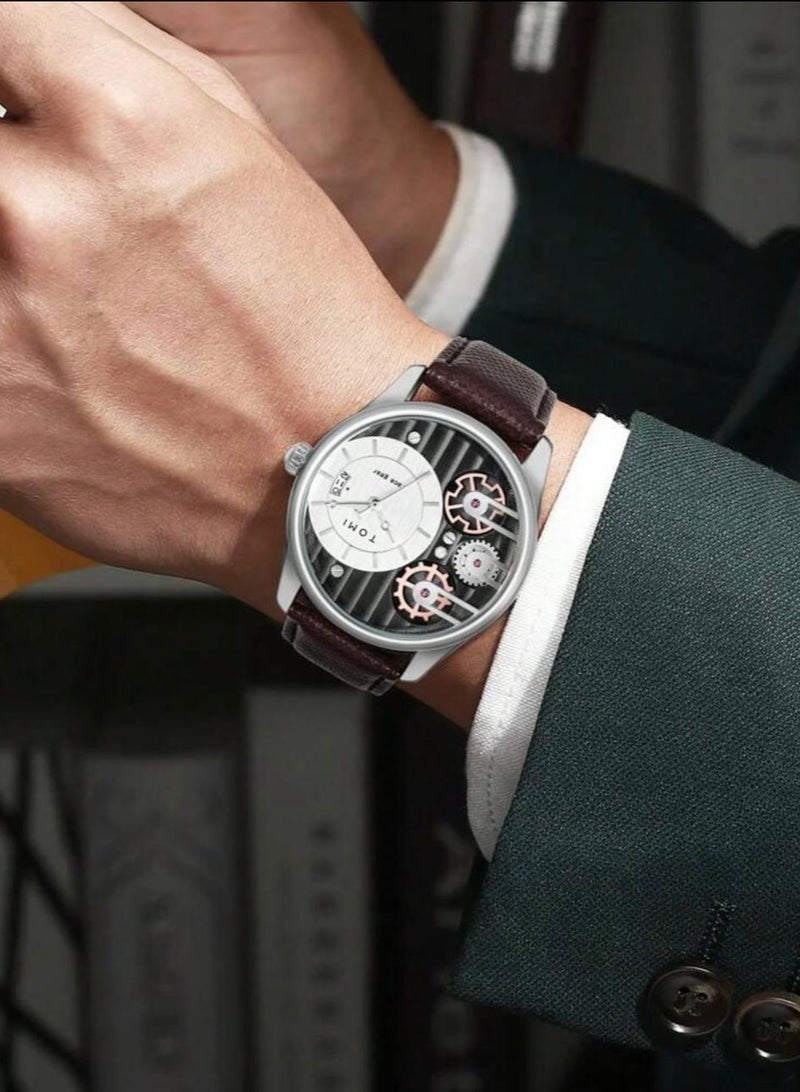 TOMI - A distinctive wrist watch with analogues, a black leather strap, and a brown strap for men from TOMI, in addition to displaying the date on a daily basis. - Image 1