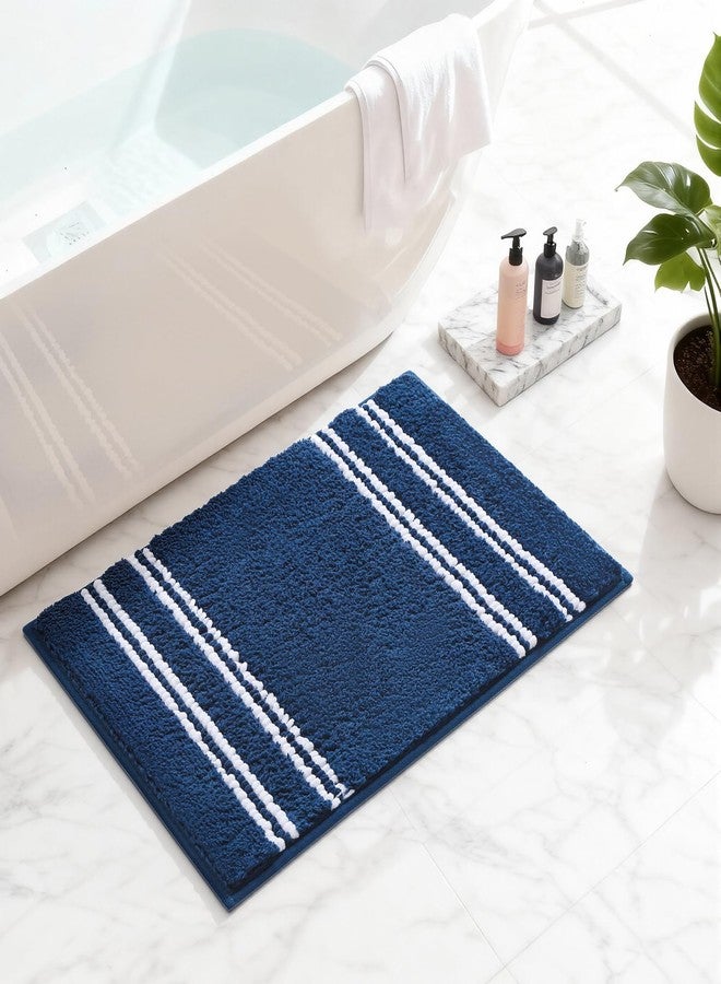 Kmson Bathroom Rugs Mat, 17"x24" Ultra Soft Washable Shaggy Chenille Bath Rugs, Non-Slip Fluffy Thick Water Absorbent Microfiber Mat for Bathtub, Sink and Shower, Navy Blue - Image 1