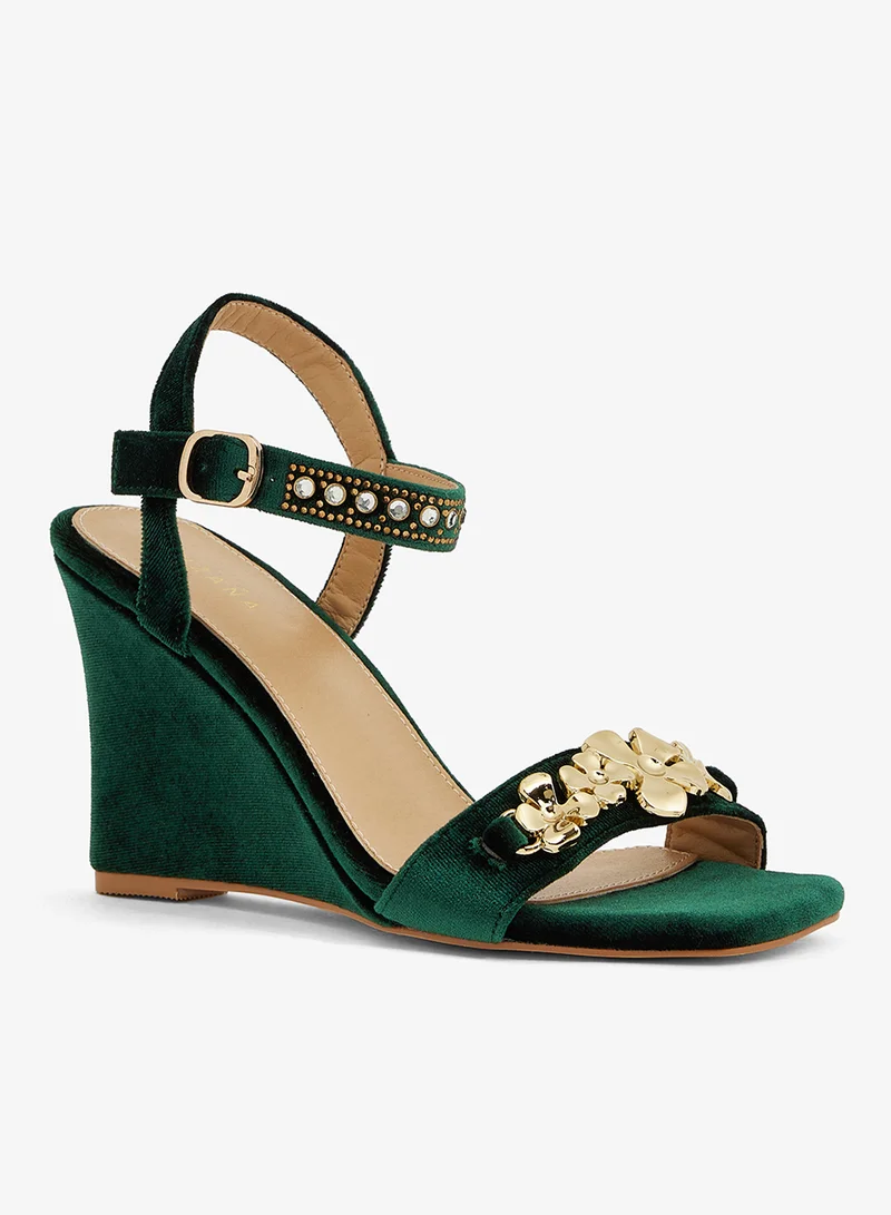 Khizana Emerald green wedge sandal with gold floral embellishment and ankle strap