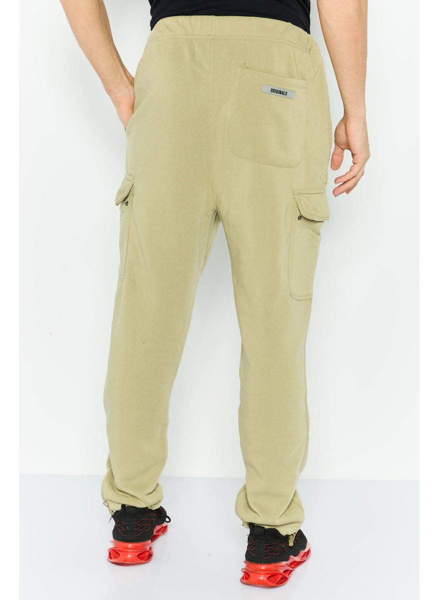 Men Regular Fit Brand Logo Cargo Sweatpants, Olive - pzsku/ZC85F9F4C87E1831A8BEDZ/45/_/1739801730/124ef6f5-4d54-4a3f-98ab-00589e0ace89