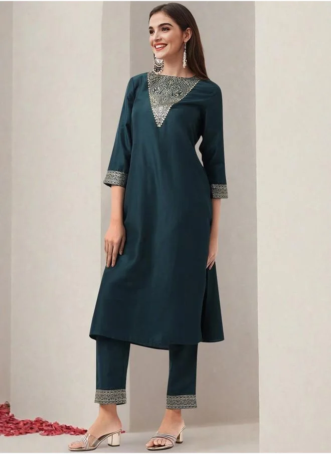 ISHIN Polyester Women Green Polyester Kurta Set with Embroidered pattern Tunic and Palazzo features a Round neckline and Three-Fourth Sleeve secured with Elastic closure and styled in Straight Fit ideal for Festive moments — designed to make heads turn.
