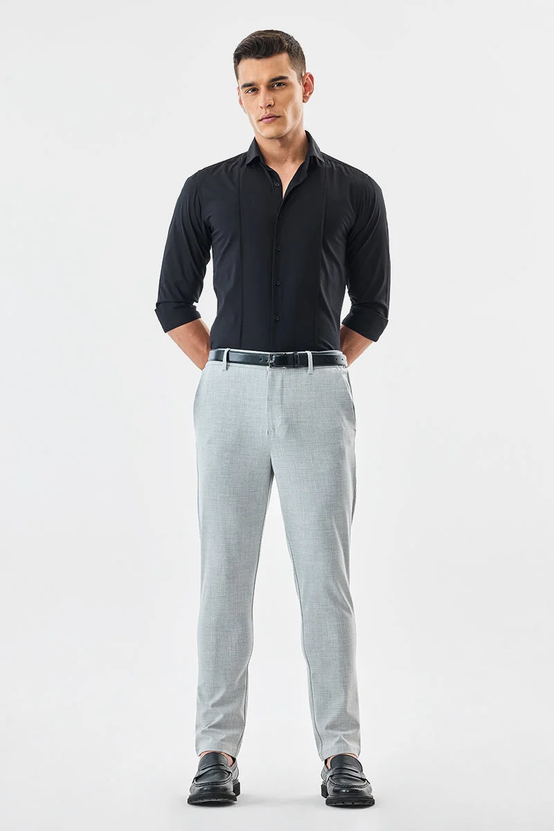 SNITCH بنطلون كاروهات بقصة ضيقة ومرونة