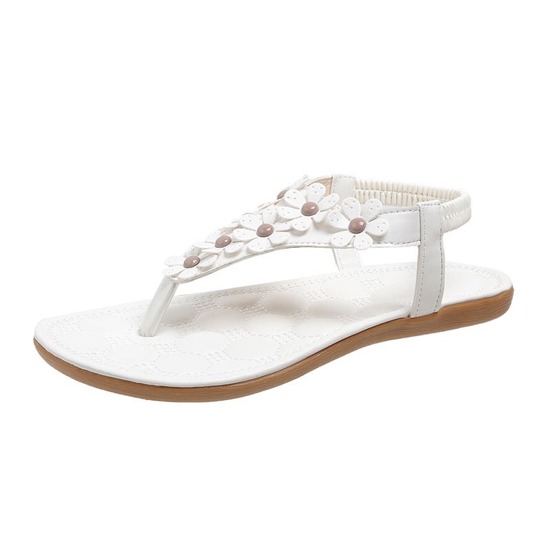 Foreign trade large size women''s shoes 2023 Summer new flat bottom Bohemian rivet toe women''s sandals beach shoes wholesale - Image 1