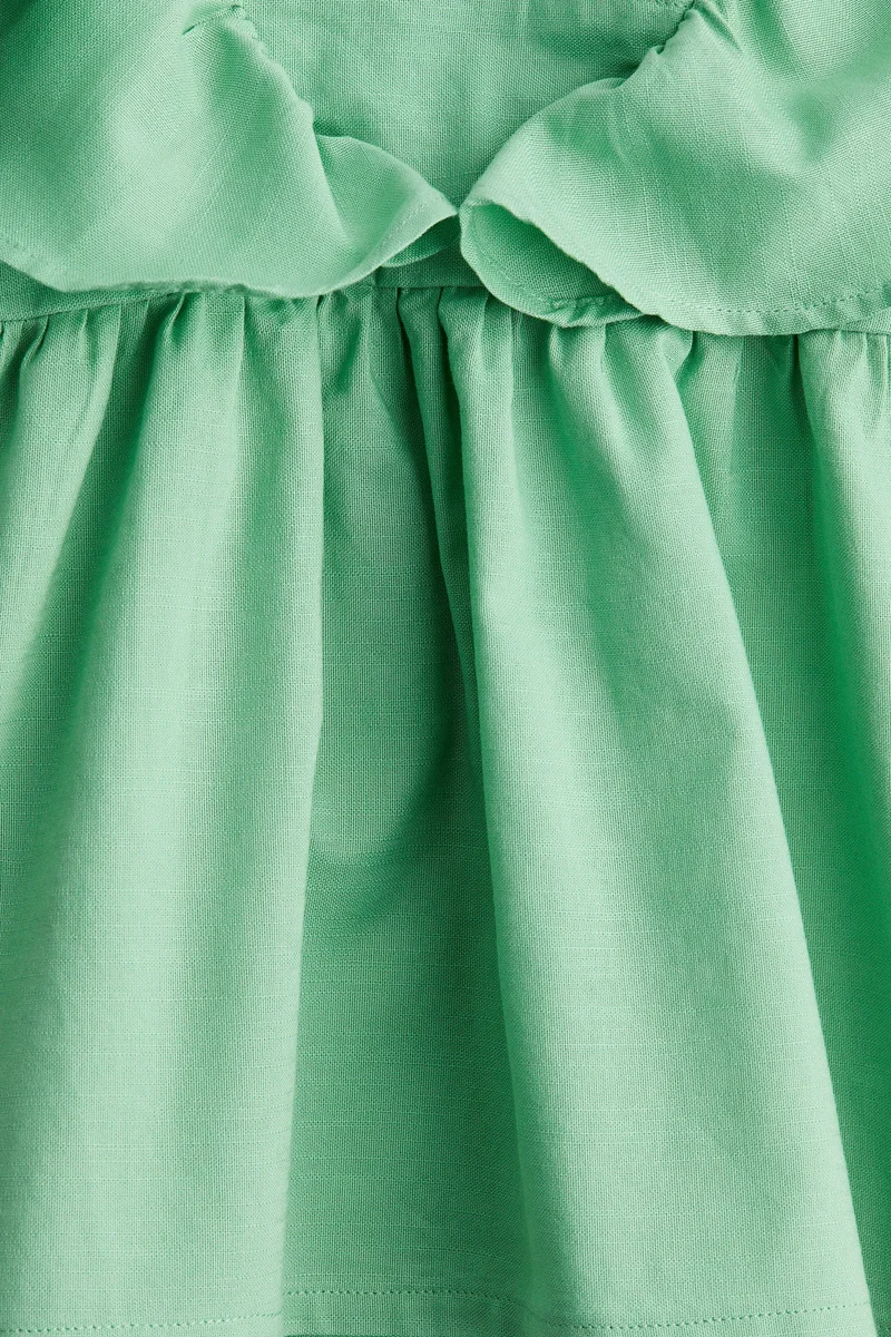 اتش اند ام فستان مزين بكشكشة