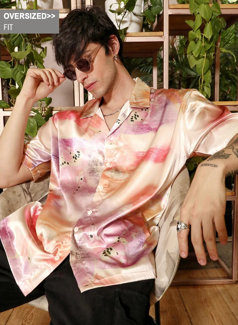 Campus Sutra Campus Sutra Men's Orange & Purple Abstract Sheen Oversized Shirt For Casual Wear | Cuban Collar | Short Sleeve | Button Closure | Oversized Shirt Crafted With Comfort Fit For Everyday Wear