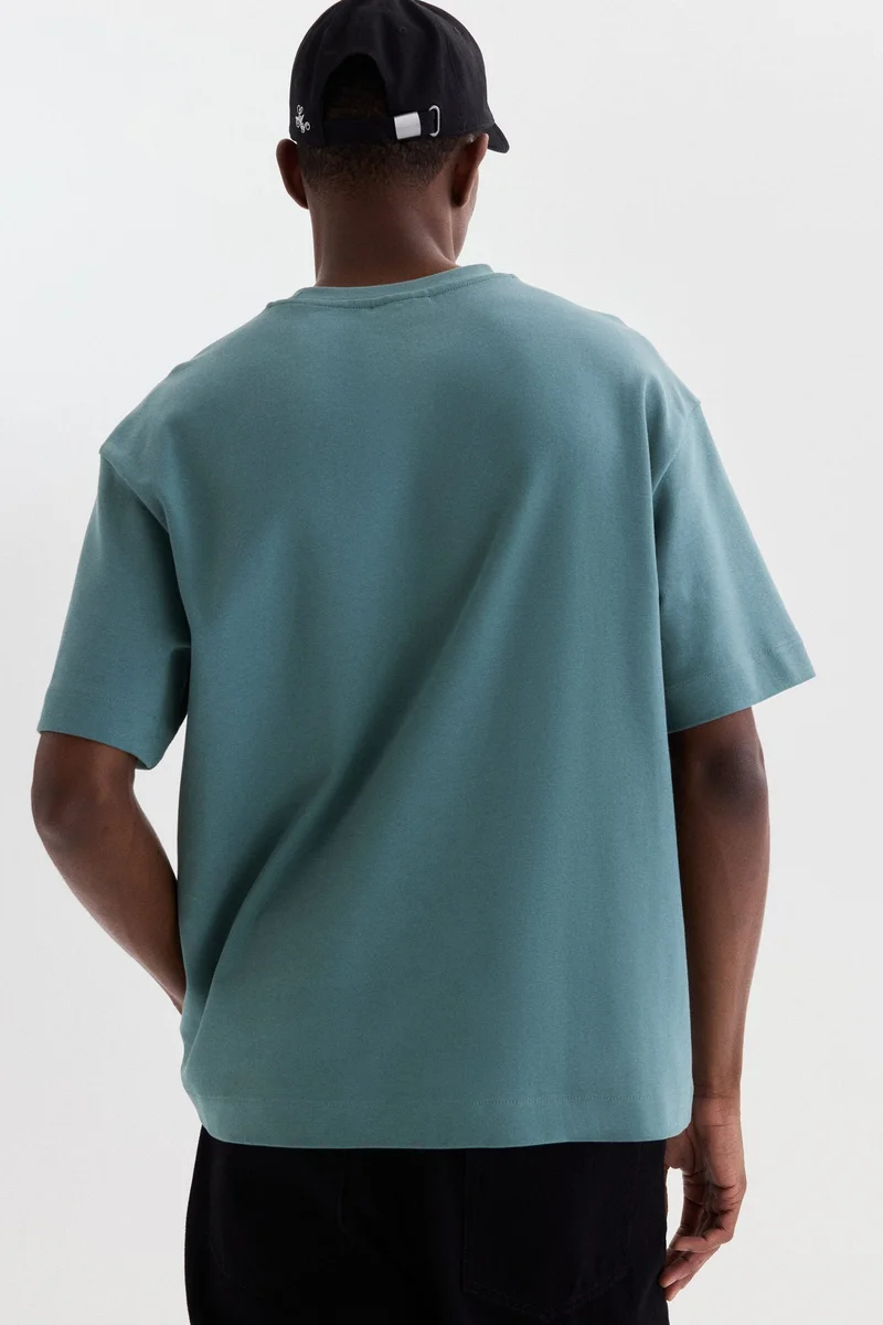 H&M  Loose Fit Interlock T-shirt for Men | Best Price UAE