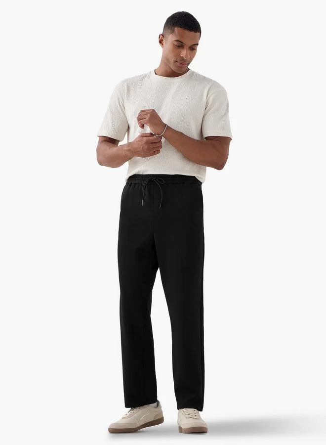 ايكونيك بنطلون أيقوني بقصة عادية مع رباط للإغلاق وجيوب