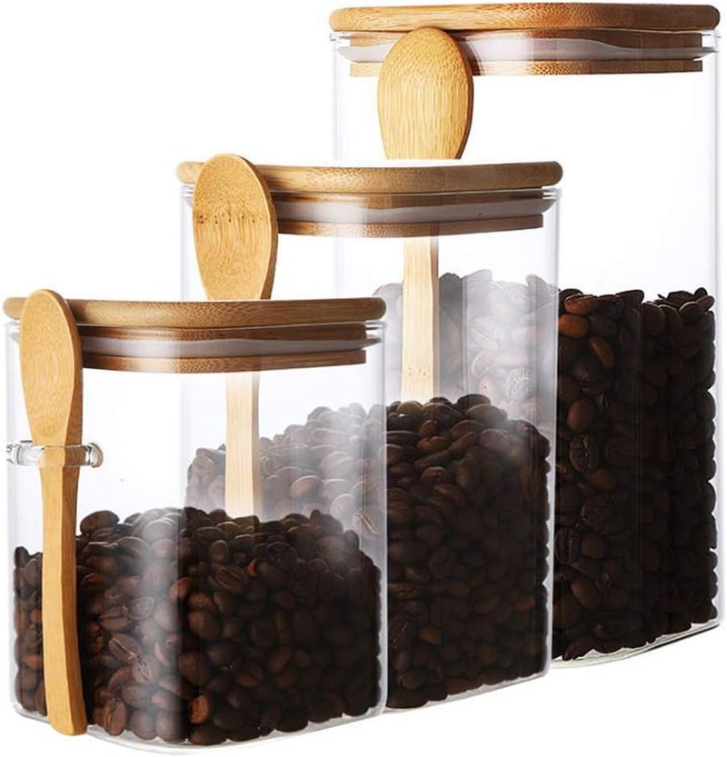 كيليدز جرة تخزين زجاجية بأغطية خشبية وملعقة، حاوية زجاجية بوروسيليكات شفافة محكمة الإغلاق لتخزين الطعام في المطبخ لحبوب القهوة والشاي السائب والمكسرات والسكر والحلوى والتوابل (1000 مل) - Image 1