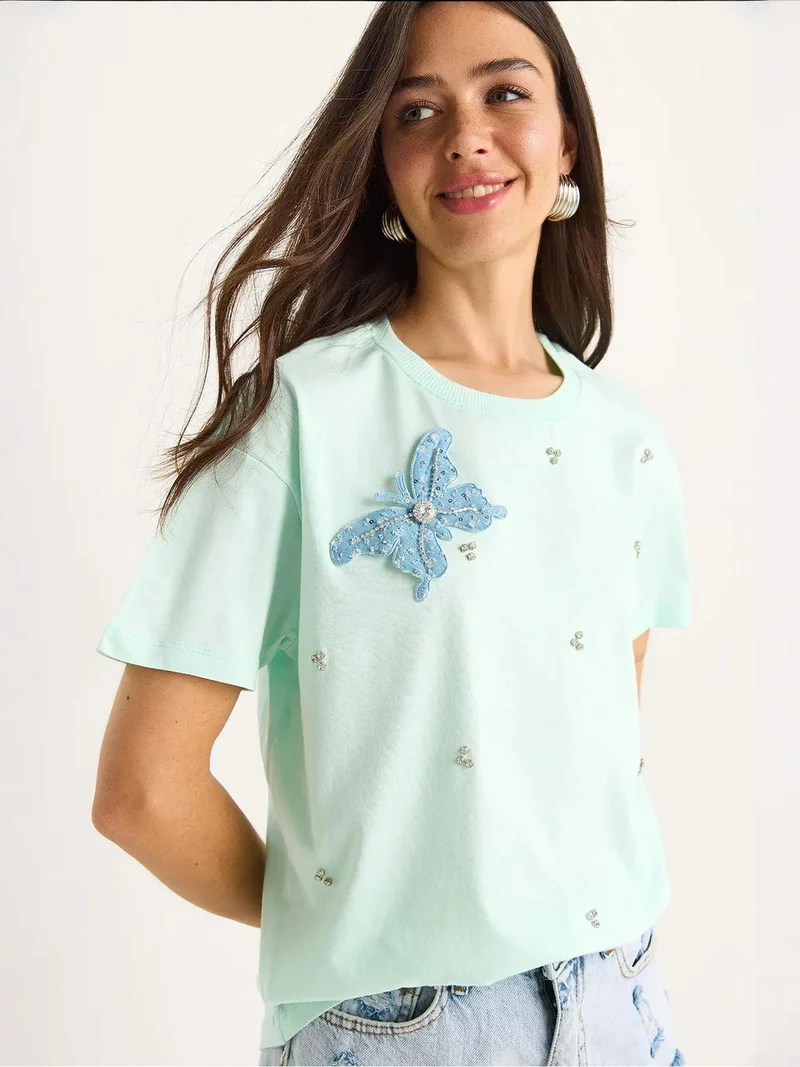 بيانكو لوتشي تيشيرت لوكسي مطرز بياقة دائرية