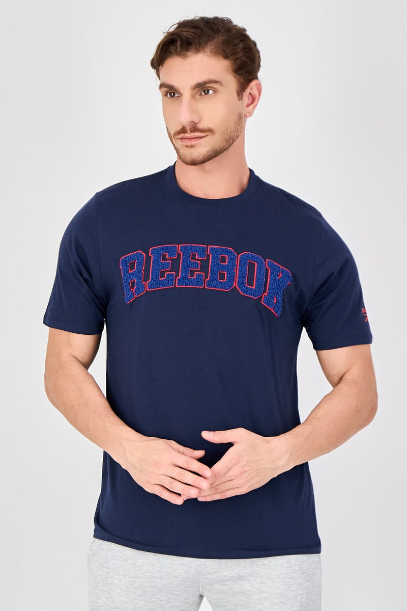 Reebok تي شيرت رياضي للرجال بأكمام قصيرة مناسب للخارج، أزرق داكن - Image 1