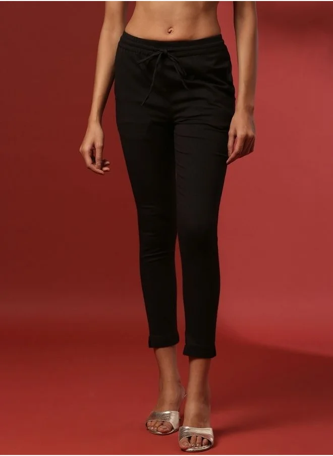 Abhishti Fitted narrow  stretch pants with slits- black