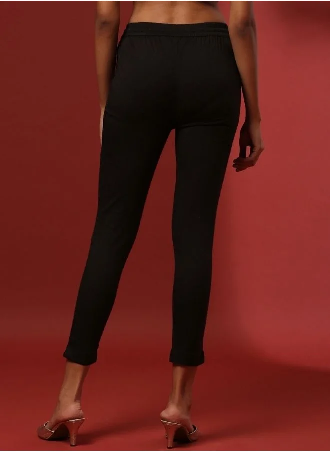 Abhishti Fitted narrow  stretch pants with slits- black
