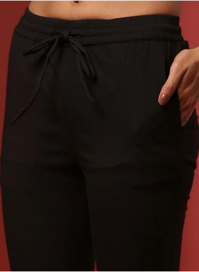 Abhishti Fitted narrow  stretch pants with slits- black