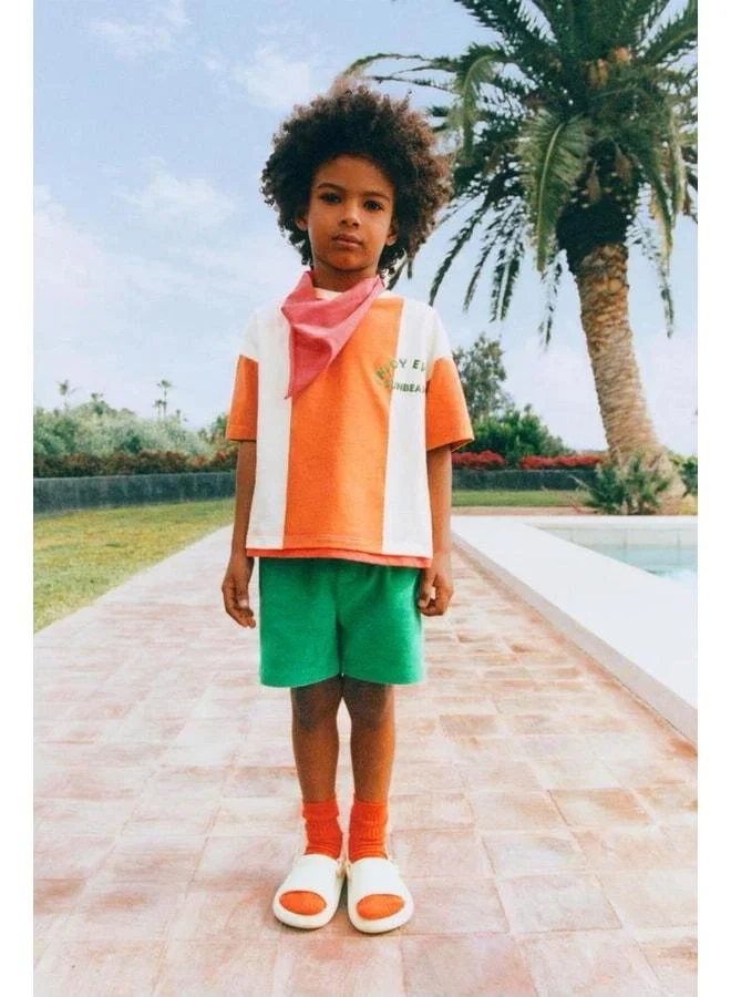 Magu Boys' Cotton Green and Orange Slogan T-Shirt and Shorts Set – Detailed with Sunbeam Print.