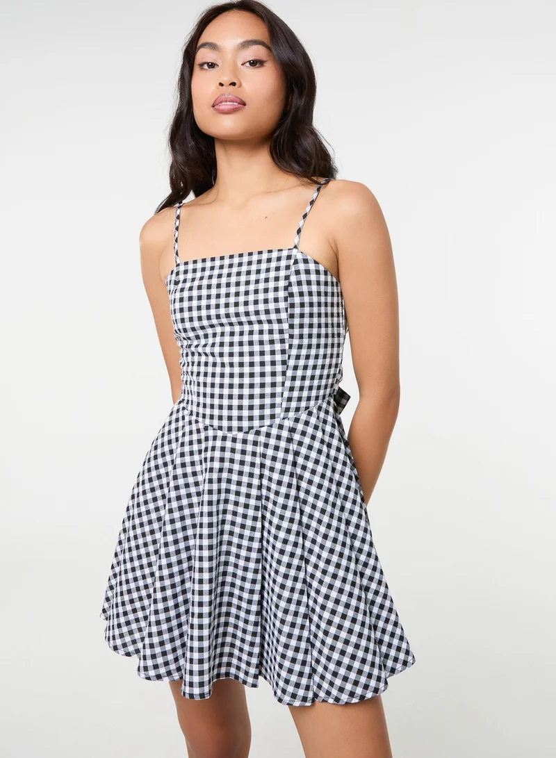 بينك فانيلا فستان قصير كاروهات بظهر فيونكة