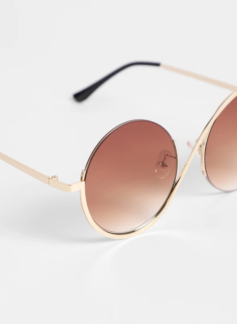 Haute Sauce Haute Sauce Women's Swirl Round Sunglasses For Casual Wear | One-Size | Gold Alloy Frame | Brown Polarized Lens | Half Rim | Eyewear For Woman & Girls
