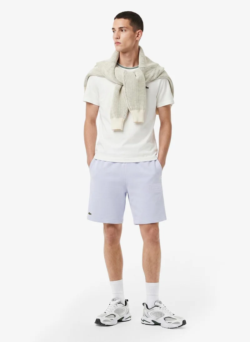 Lacoste  Regular Fit Embossed Unbrushed Fleece Shorts for Men | Best Price UAE