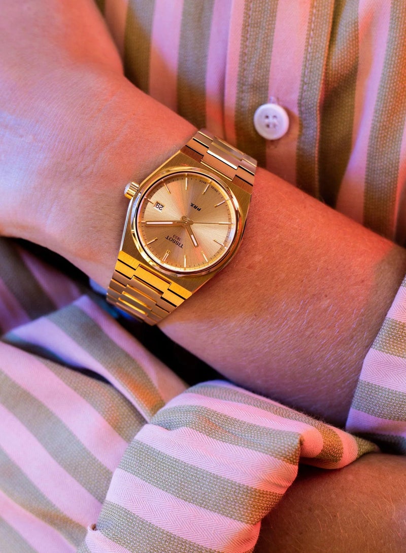 TISSOT ساعة كواتز سويسرية مصنوعة من الفولاذ المقاوم للصدأ بطلاء ذهبى بقطر 35 مم T137.210.33.021.00 للرجال والنساء - Image 5