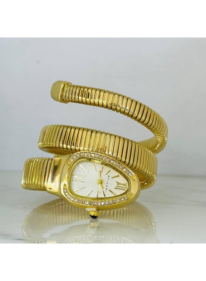 بولغاري ساعة يد حريمي فاخرة أنالوج – سوار حلزوني ذهبي بإطار مرصع بالفصوص