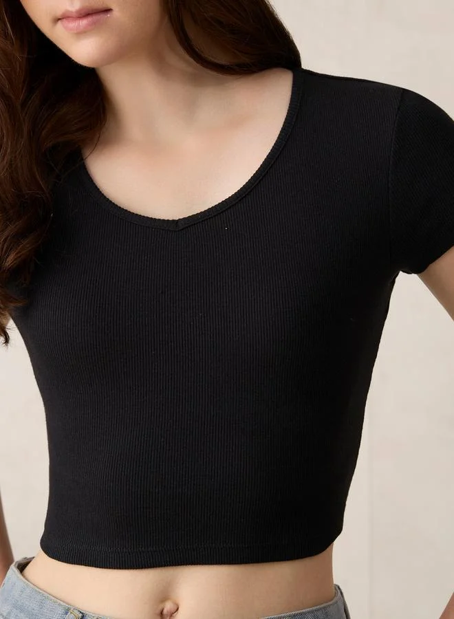 Outzidr  Black Basic Fitted V Neck Ribbed Top for Women | Best Price UAE
