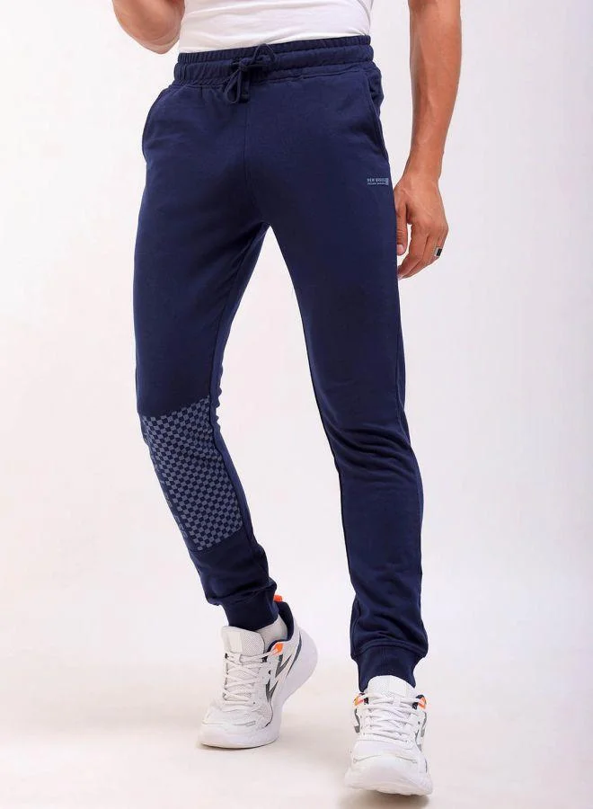 The Indian Garage Co Men Slim Fit Solid Mid-Rise Stretchable Knitted Jogger Trousers