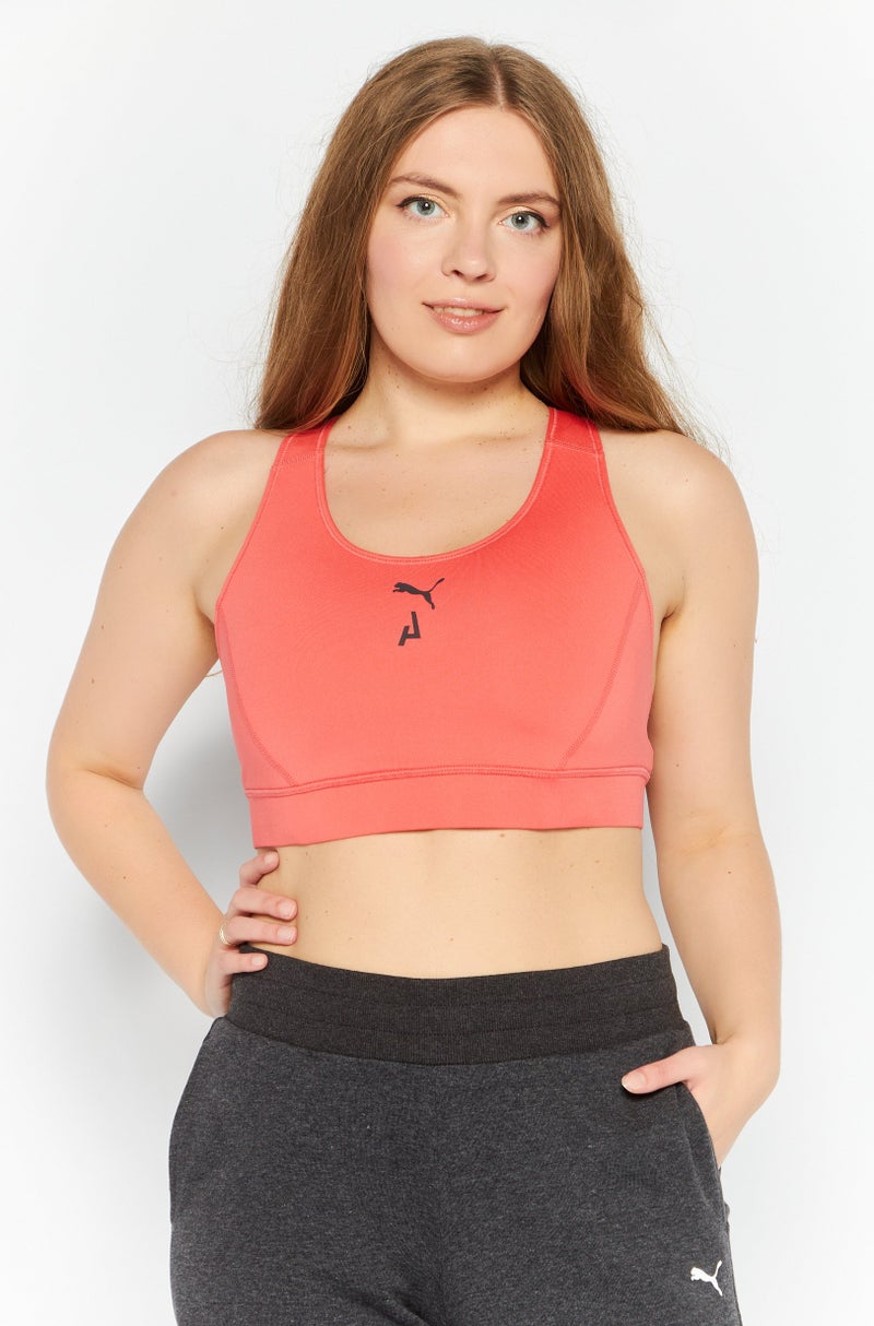 PUMA Women Sportswear Fit Training Sport Bra, Coral - Image 1