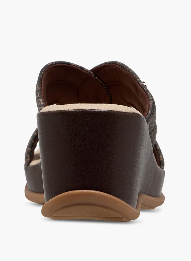 فلورا بيلا من شو إكسبرس Monogram Print Slip-On Sandals with Wedge Heels