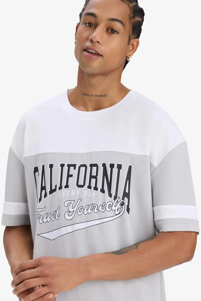 ديفاكتو DeFactoFit Oversize Fit Crew Neck Printed Sports T-Shirt