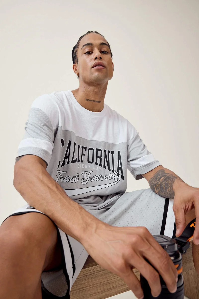 ديفاكتو DeFactoFit Oversize Fit Crew Neck Printed Sports T-Shirt