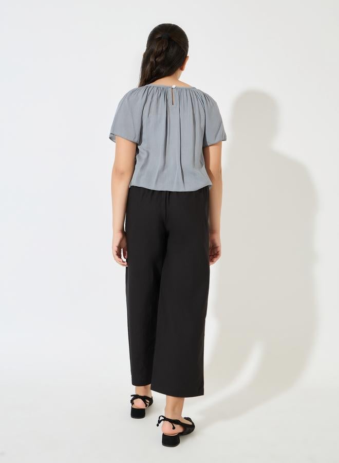 ستايلي طقم بناتي قطعتين بلوزة قصيرة الأكمام وبنطلون واسع الساق - Image 4