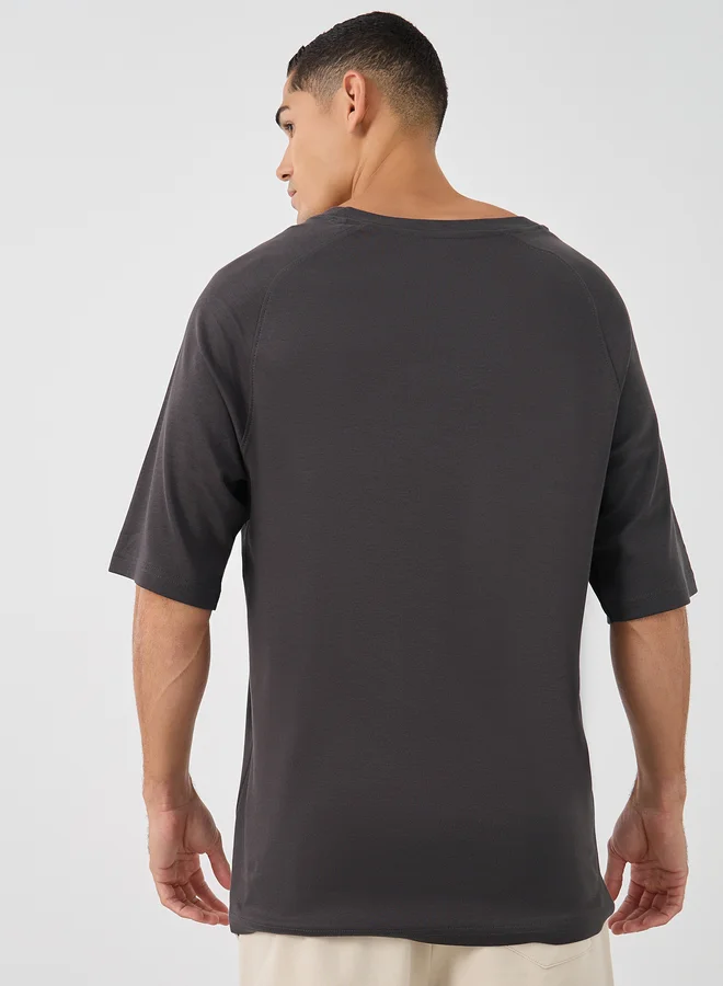 Styli Styli Men Solid Raglan Sleeves Oversized T-Shirt