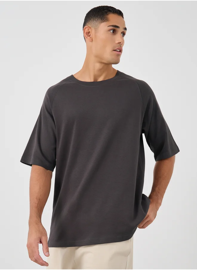 Styli Styli Men Solid Raglan Sleeves Oversized T-Shirt