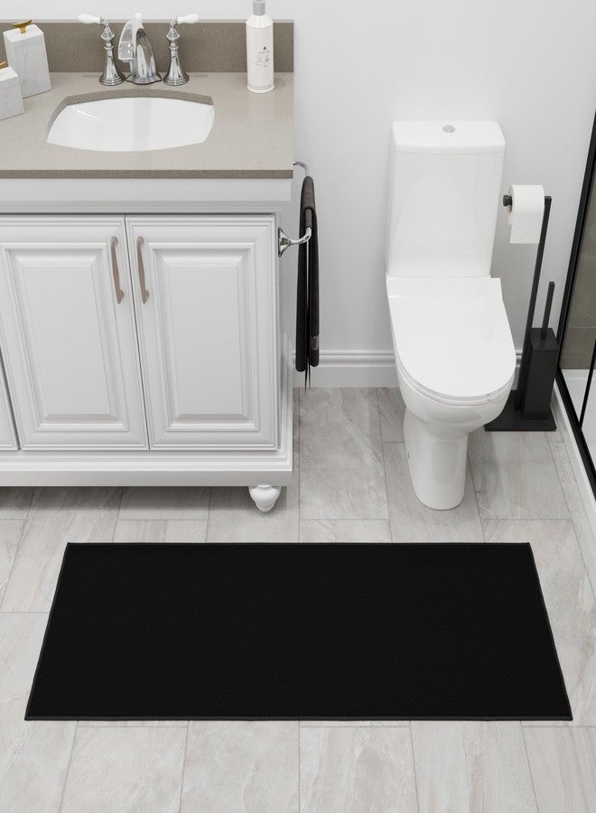 Ottomanson Non-Slip Bathroom Mat, Low-Profile Quick-Dry Bath Rug, Entryway Mat for Sink Areas or Front Door, 31" x 60", Solid Black - Image 1
