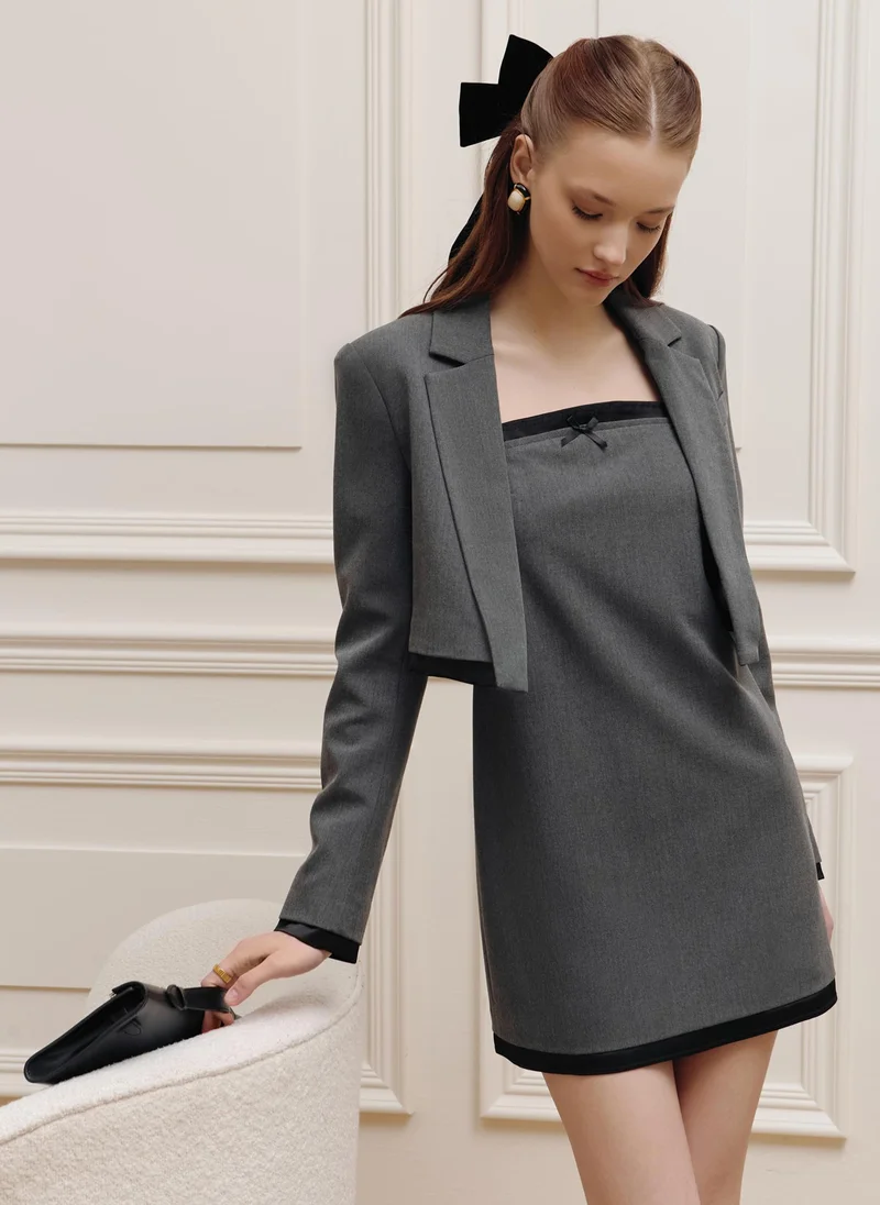 Double material mini dress with collar bow
