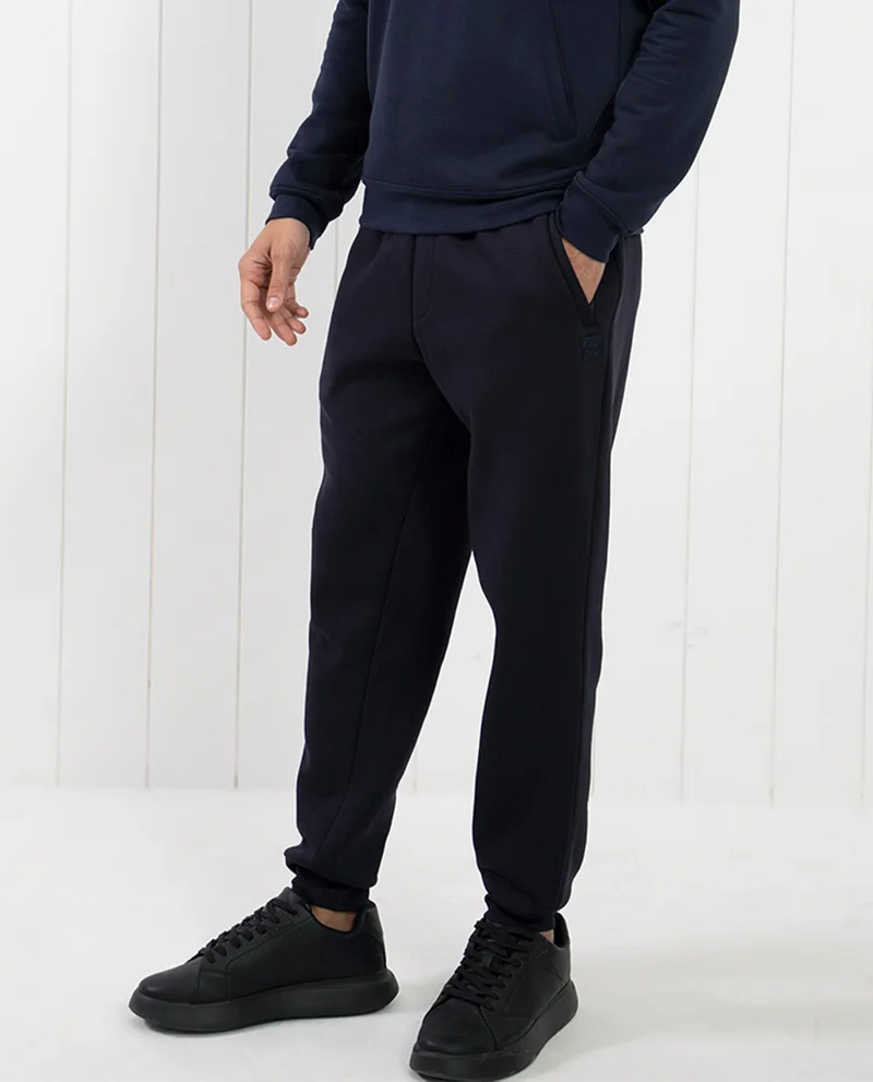 رير رابِت بنطلون رياضي Rare Rabbit Saho Navy Mid-Rise للرجال