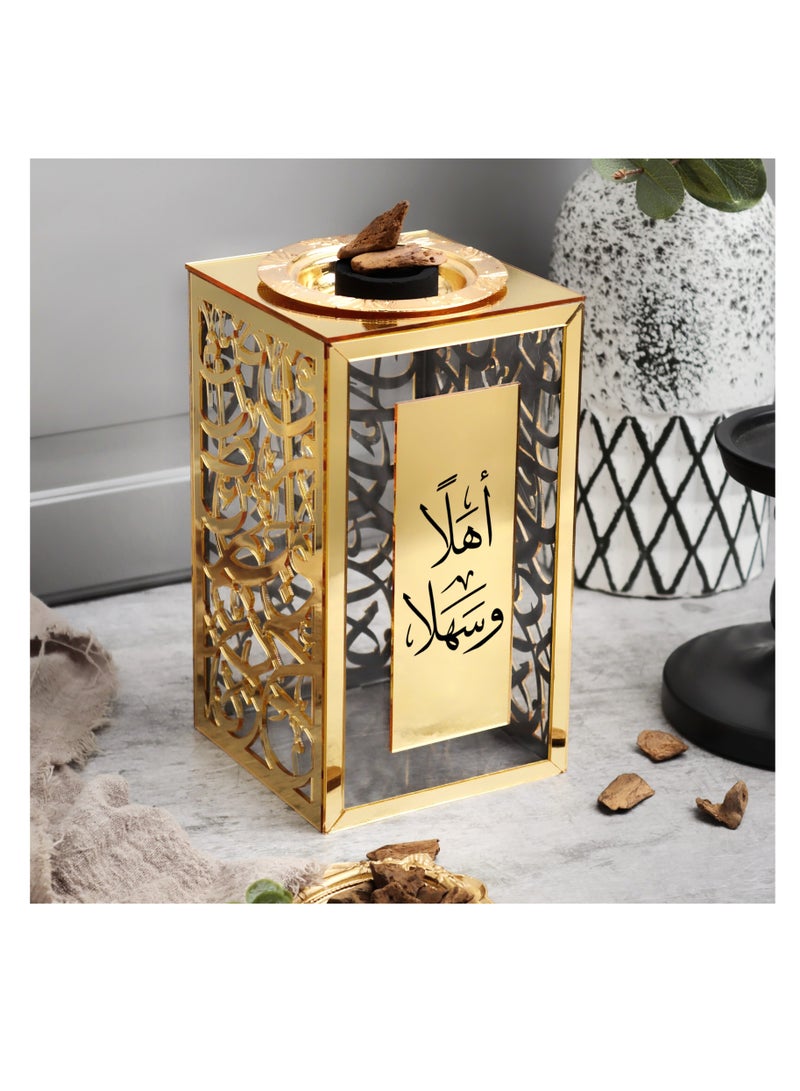 حكاية شمعة مبخره بخور بزخرفة عربية مصنوعه من الاكريليك اللامع والشفاف ، تحمل عبارة "أهلاً وسهلا" بتصميم مميزة - Image 1