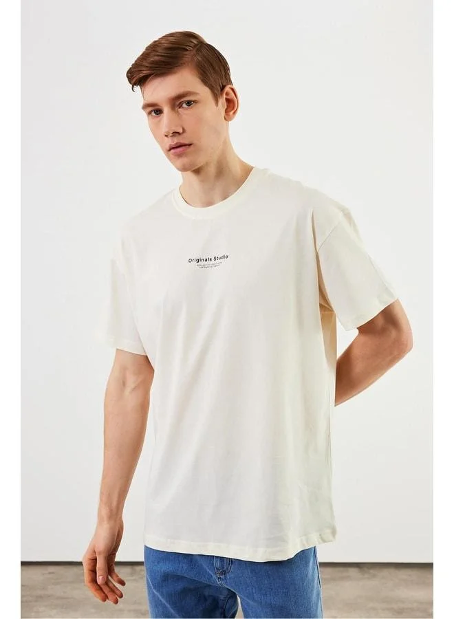 Mmetalic Leo Men's Oversize Basic Ecru T-Shirt with 100% Cotton Crew Neck and Print Details.