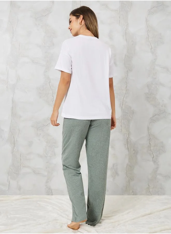 ستايلي Styli Slogan Printed T-Shirt and Ruffle Waist Pyjama Set