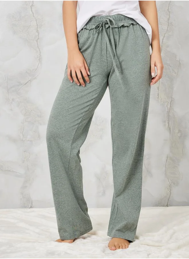 ستايلي Styli Slogan Printed T-Shirt and Ruffle Waist Pyjama Set