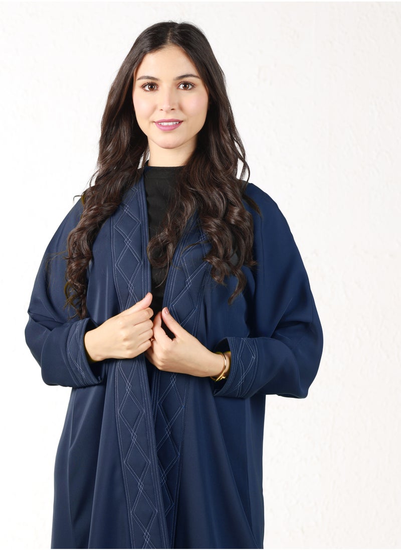 Navy colored abaya with white threads on the sleeves and collar - pzsku/ZC935C15A1E3CFCE4F931Z/45/_/1709372069/eb2a110a-7f0b-4f17-8a70-708a5d150d99