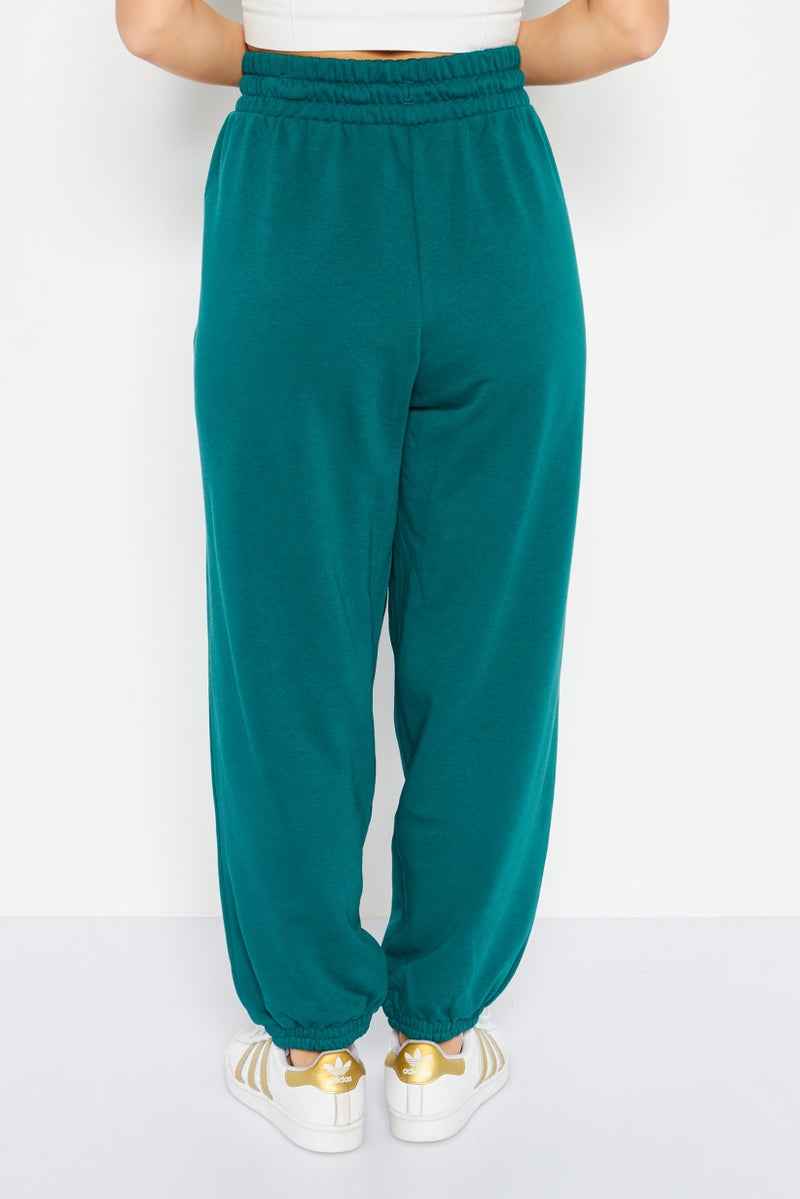PUMA Women Relaxed Fit Embroidered Outdoor Sweatpants, Green - Image 3