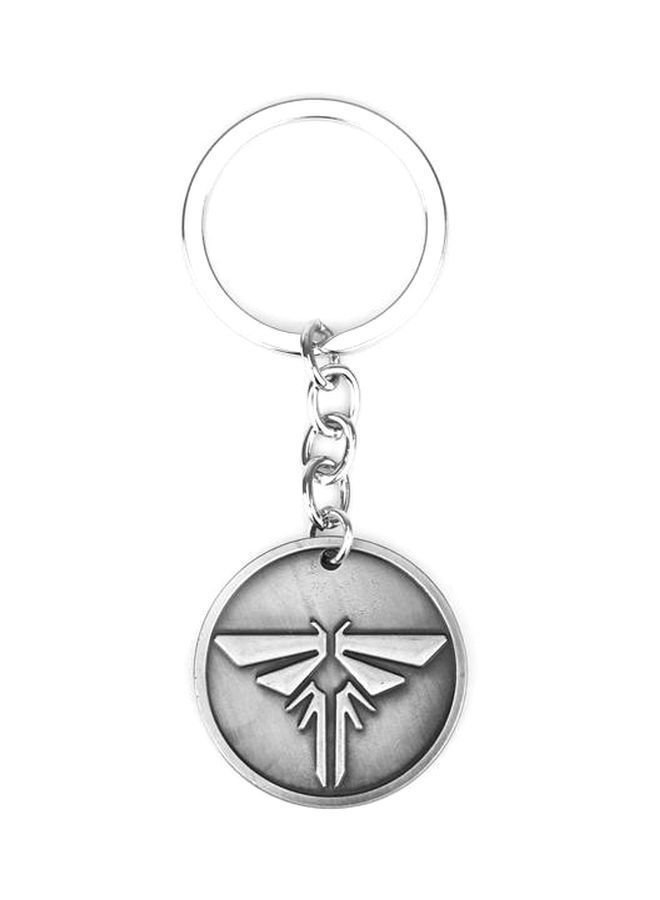 نيبمينينت سلسلة مفاتيح بتصميم شعار لعبة الفيديو "Last Of Us" فضي - Image 1