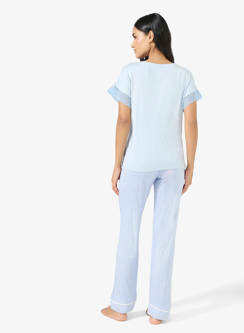 جينجر طقم تي شيرت وبنطلون بيجامة برسومات