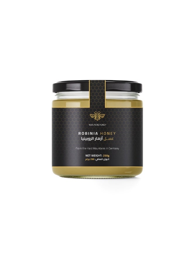 DW Power Robinia Honey 250g – A premium light-colored German raw honey from acacia blossoms, cherished for its mild sweetness, delicate floral aroma, and crystal-clear clarity. - Image 1