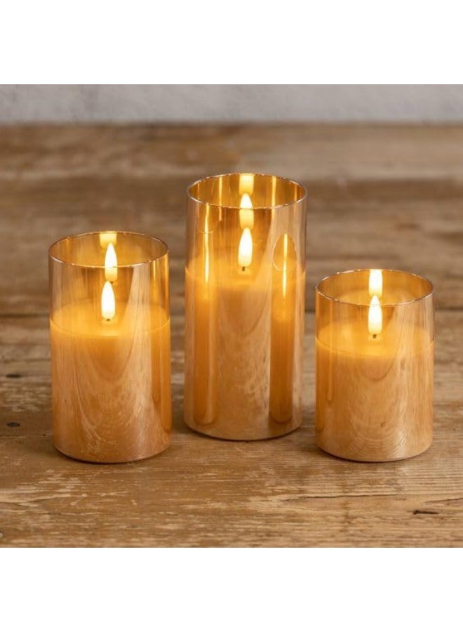 مادو جاليري مجموعة شموع LED زجاجية من مادو جاليري مع لهب راقص وتعمل بالبطارية، مجموعة من 3 قطع في صندوق واحد بألوان ذهبية أو شفافة، شمع حقيقي وملمس حقيقي للهب الشموع الاصطناعية (لون ذهبي) - Image 1