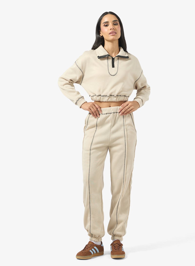 جينجر بدلة رياضية بسحاب وتفاصيل خياطة متباينة - Image 1