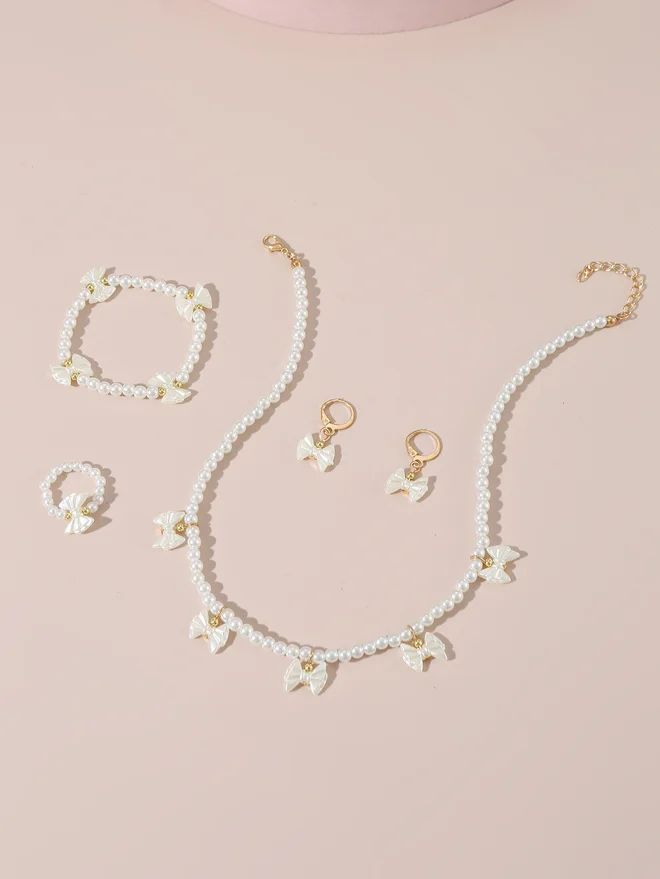 تايك تو Take Two Set of 4 - Bow Pendant Faux Pearl Necklace, Bracelet Earrings and Ring
