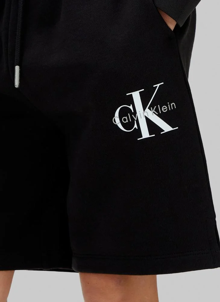 Calvin Klein Jeans  Youth Monologo Relaxed Fit Shorts for Men | Best Price UAE