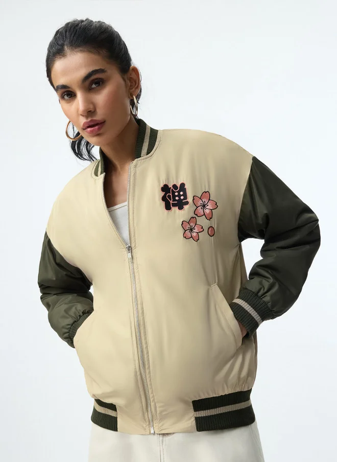 The Souled Store  The Souled Store Women Oversized Varsity Jacket with Graphic Print  | Best Price UAE