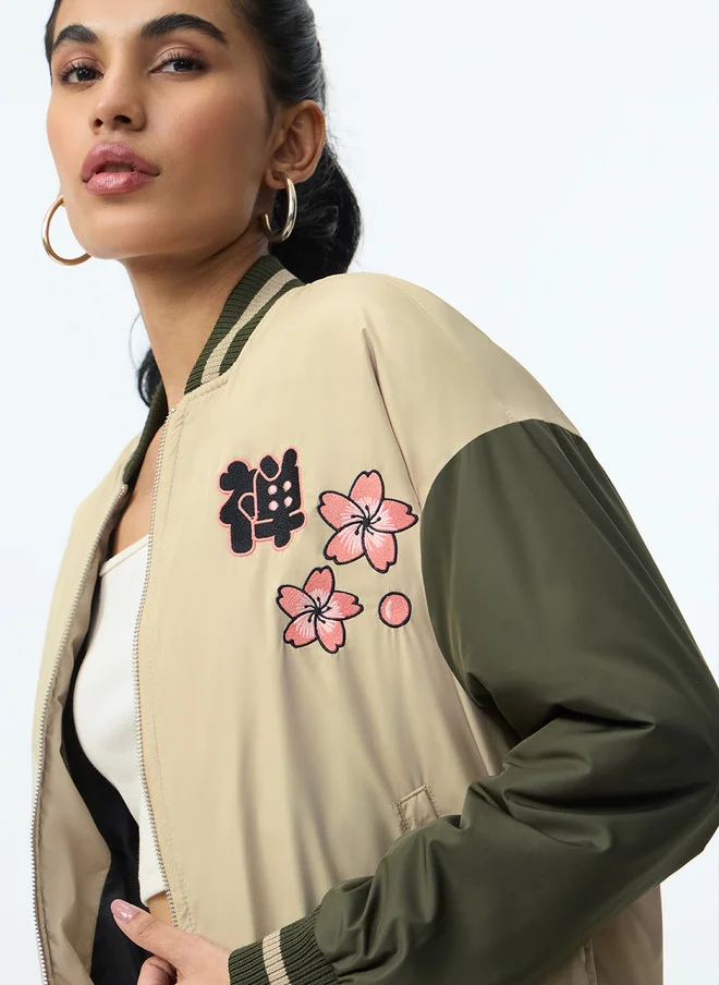 ذا سوليد ستور The Souled Store Women Oversized Varsity Jacket with Graphic Print